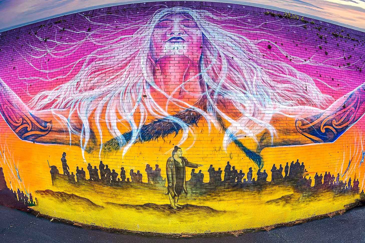 Impressive street art adorns a wall in Onehunga.